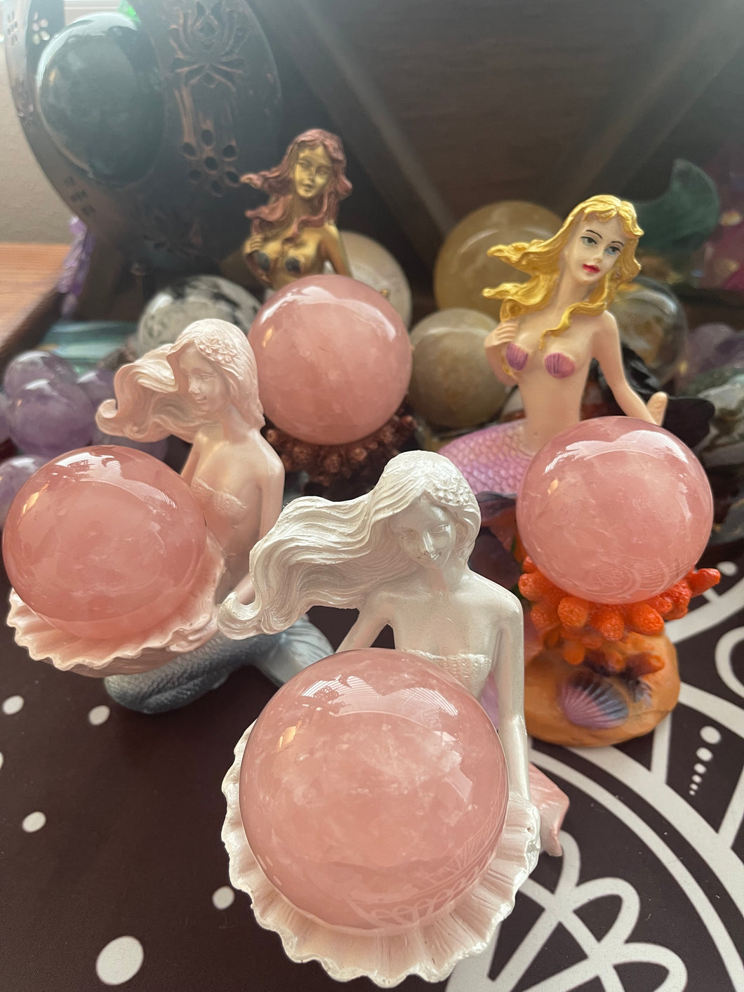 Mermaid stand and rose quartz sphere