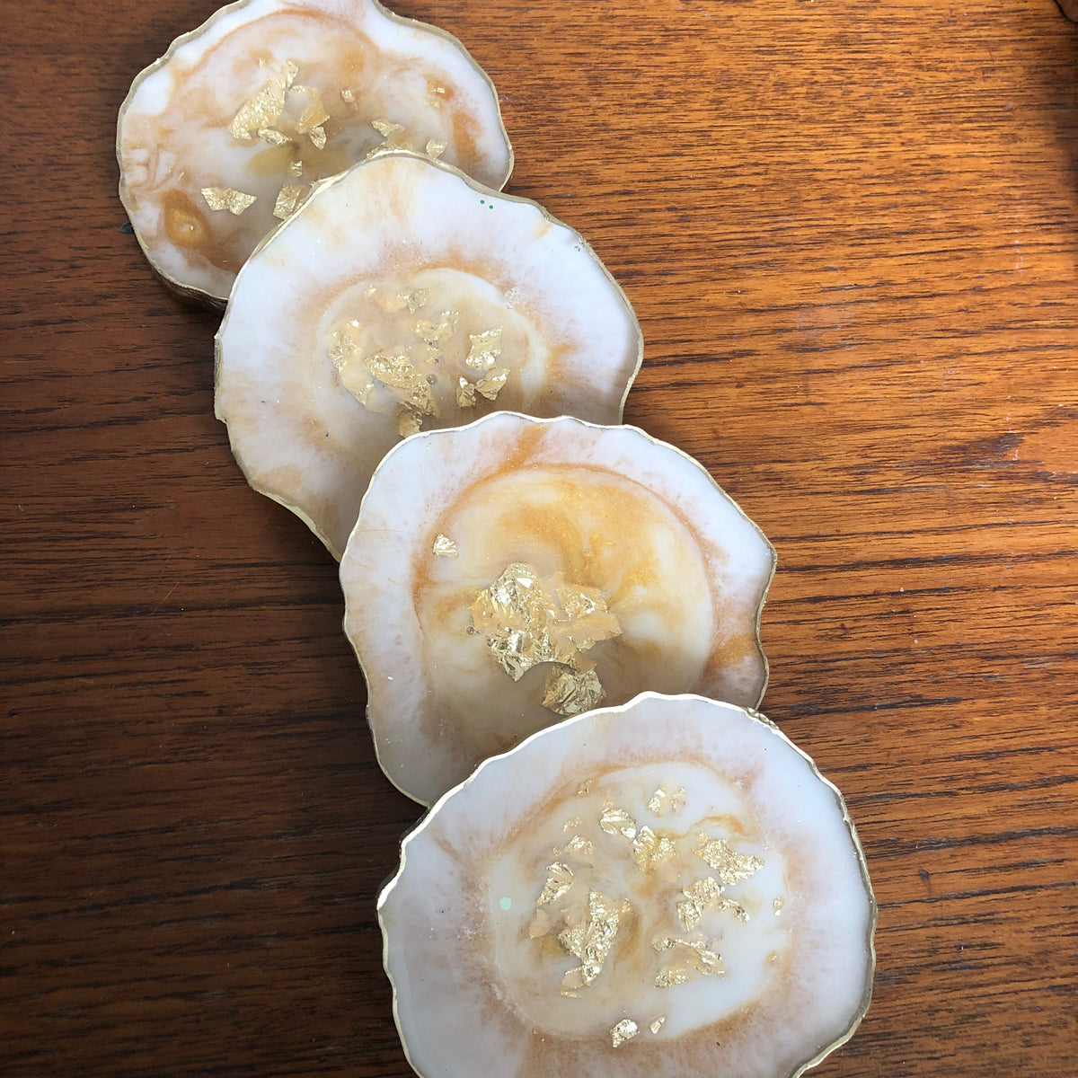 White and gold resin coasters