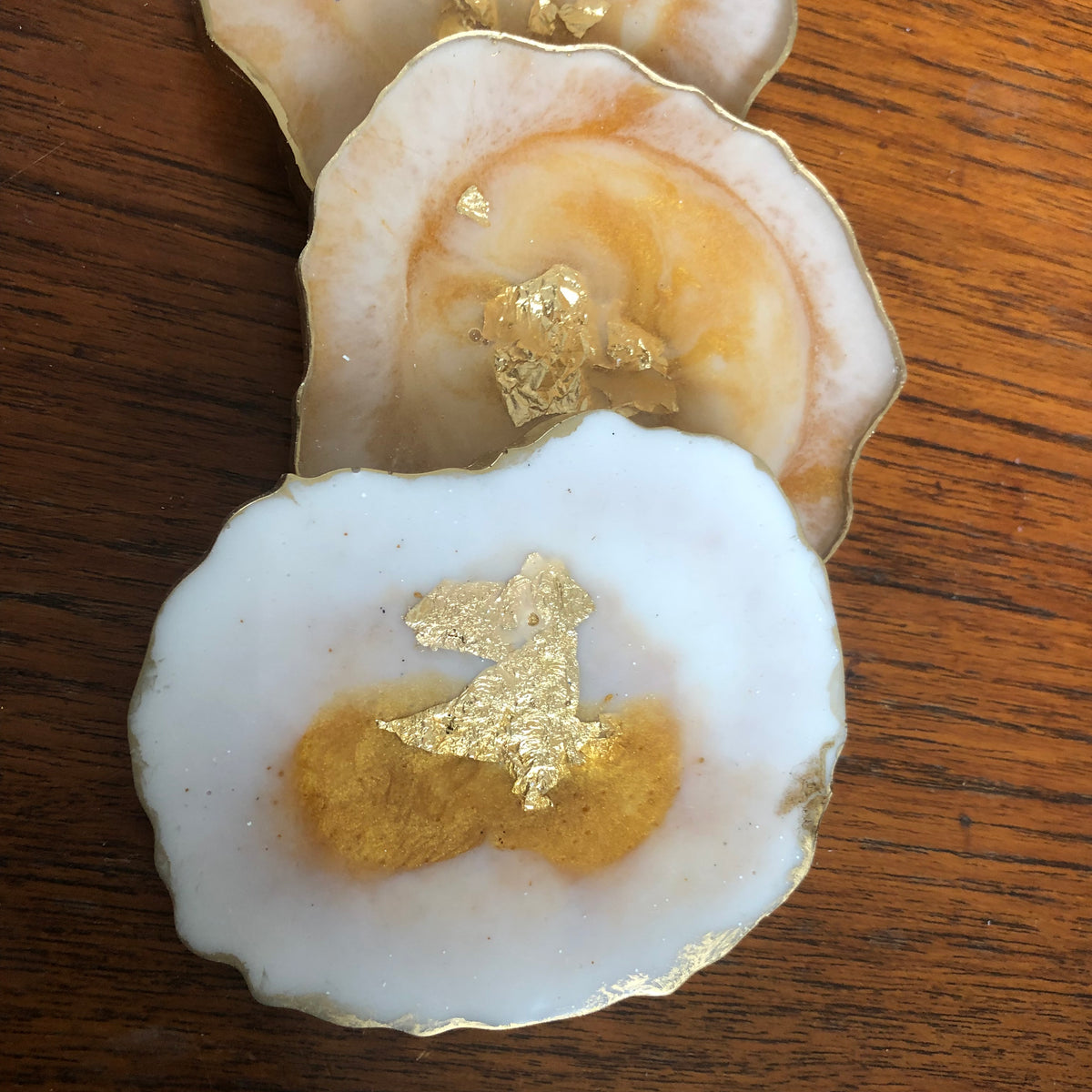White and gold resin coasters